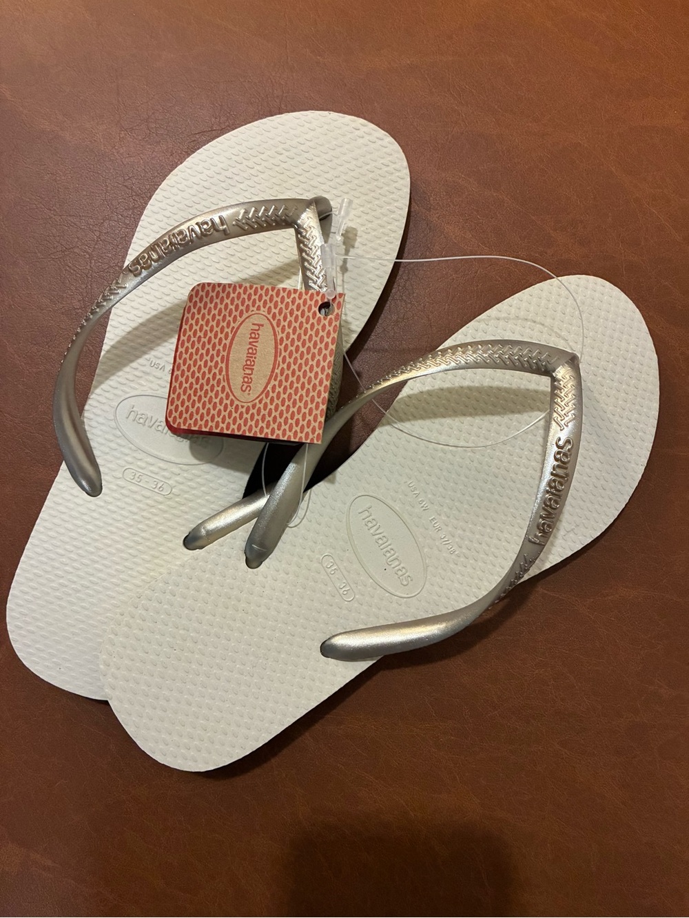 Havaianas Women's Flip Flops in Beige with Metallic Silver Straps